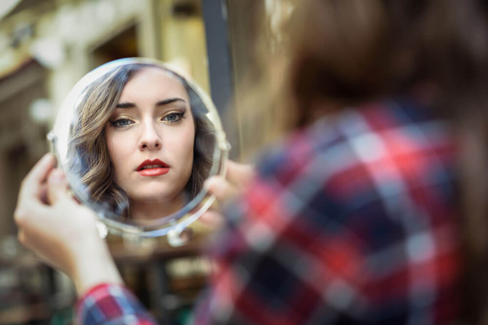 Women Looking in the Mirror for Self Improvement | Happiness 2.0