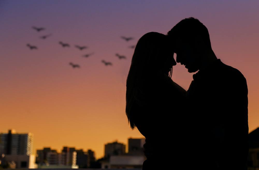 breathtaking view of couple at sunset