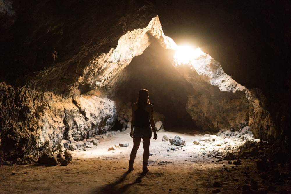 Women in Cave exploring world of appearances and and the world of forms | Happiness 2.0