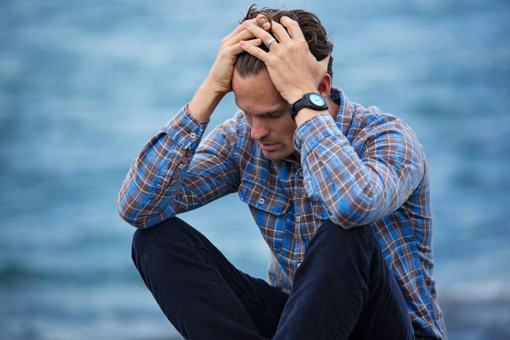 Stressed Man Thinking about Forgiveness | Edward G Dunn